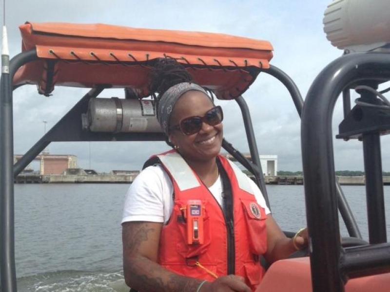 A NOAA boatswain on a small boat.