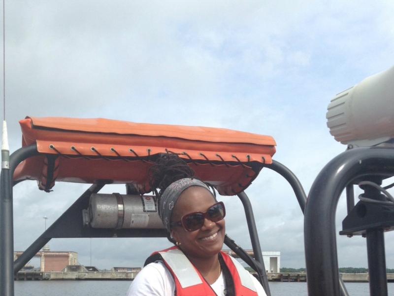 Leslie Allen driving a small boat from NOAA Ship Ronald H. Brown. Photo: NOAA/Michael Lastinger