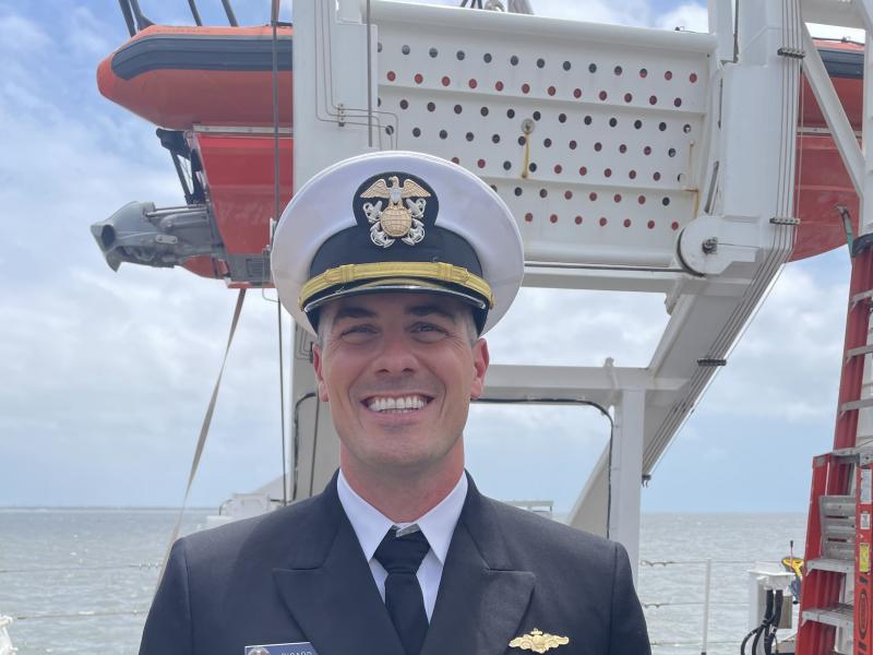 LCDR Dustin Picard on the deck of NOAA Ship Nancy Foster.