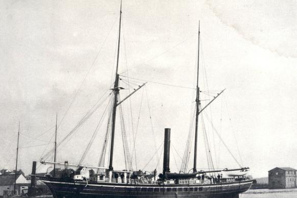 A black and white photo of the Coast and Geodetic Survey steamer BLAKE at a dock
