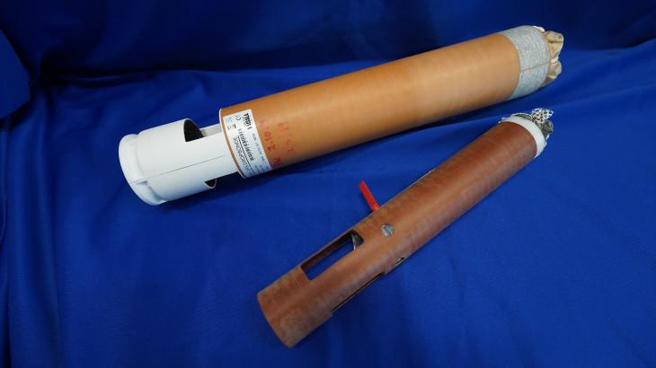 One large and one small weather probe known as a dropsonde