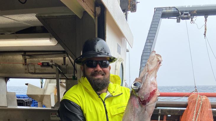 Matt McFarland holding a large fish.