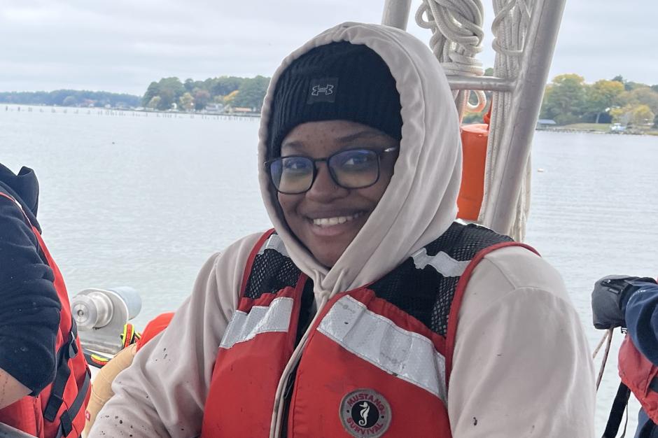 A woman on the deck of a ship