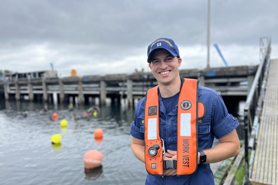 A U.S. Public Health Service Officer standing by the water during a NOAA diver training. 